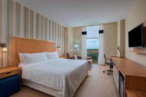 Voodi või voodid majutusasutuse Four Points by Sheraton Cancun Centro toas