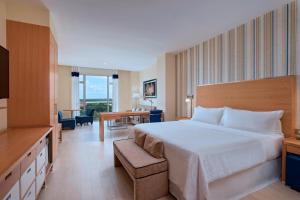 Voodi või voodid majutusasutuse Four Points by Sheraton Cancun Centro toas