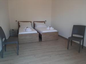 Postel nebo postele na pokoji v ubytování B&B La casa dei nonni Assergi