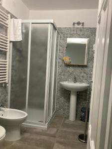a bathroom with a shower and a sink at B&B La casa dei nonni Assergi in Assergi