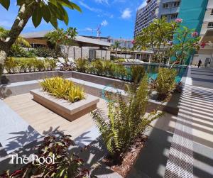Un jardín fuera de Lovely Studio Condominiums at Mesavirre Garden Residences Bacolod