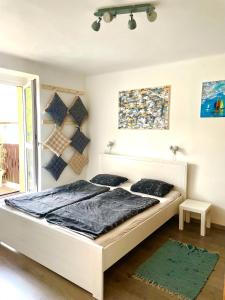 Posteľ alebo postele v izbe v ubytovaní Apartmán Galerie - Lipno nad Vltavou