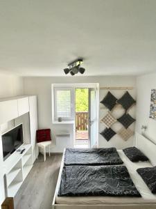 Posteľ alebo postele v izbe v ubytovaní Apartmán Galerie - Lipno nad Vltavou
