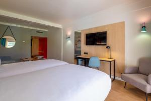 Letto o letti in una camera di Allegro Agadir