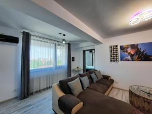 Un televizor și/sau centru de divertisment la Mamaia Apartament Familia si Copilul