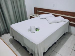 Cama o camas de una habitación en Grande Hotel Bragança