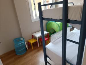 Posteľ alebo postele v izbe v ubytovaní Palfuriana 86, a 30 metros de la playa WIFI ideal con niños (21)