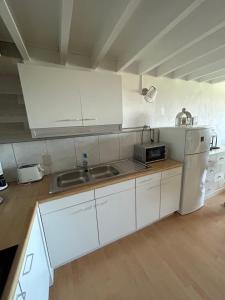 Kuchyň nebo kuchyňský kout v ubytování Hotel Halleux