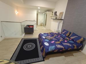 a bedroom with a bed and a book on the floor at Duplex M-City ampang klcc by Mint in Kuala Lumpur