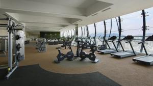 a gym with treadmills and cardio equipment in a building at Duplex M-City ampang klcc by Mint in Kuala Lumpur