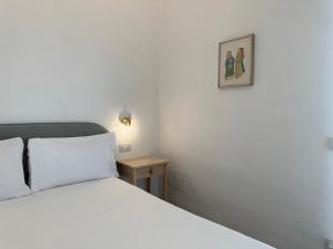 A bed or beds in a room at NG Guest House l'Acquedotto