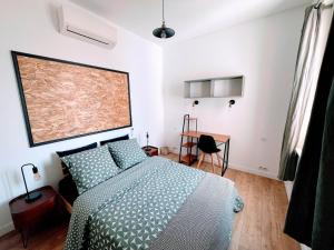 Cama ou camas em um quarto em Grand Appartement Moderne Clim