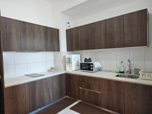 Kuchyň nebo kuchyňský kout v ubytování Luxury Troika Kota Bharu by Aura Troika
