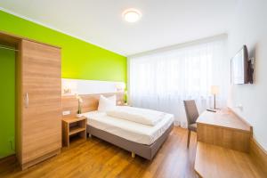 Postel nebo postele na pokoji v ubytování Hotel S16