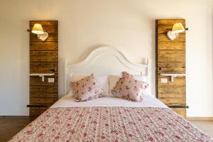 Postel nebo postele na pokoji v ubytování B&B Podere Curtatone
