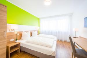 Postel nebo postele na pokoji v ubytování Hotel S16