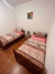 Rúm í herbergi á Apartment with sea view