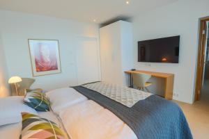 Postel nebo postele na pokoji v ubytování Apt. Hotel Hjalteyri