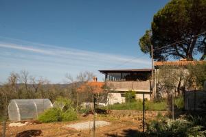 Casa PalliniにあるAgriturismo Poggio al Turco - Vista Toscanaの庭中家