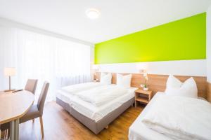 Postel nebo postele na pokoji v ubytování Hotel S16
