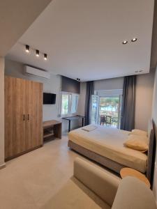 Postel nebo postele na pokoji v ubytování Estrella Rooms