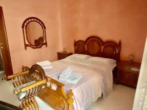 Ліжко або ліжка в номері Casa Vacanze “Da Nennè”