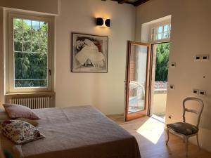 A bed or beds in a room at B&B Villa Cortese