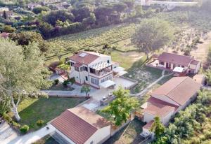 an aerial view of a house with a yard at Podere Il Ritorno in Portoferraio