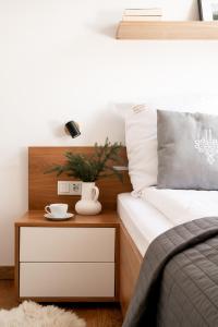 Posteľ alebo postele v izbe v ubytovaní Mountain Base - Dwupoziomowy apartament "Przy lesie II" z prywatnym jacuzzi w Kościelisku