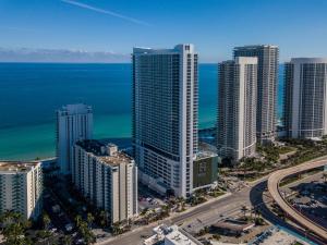 an aerial view of a city with buildings and the ocean at Heaven Resort - 2BDR BEACH HOME WITH OCEAN VIEW HOLLYWOOD! in Hollywood