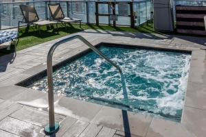 a jacuzzi tub on the top of a building at Heaven Resort - 2BDR BEACH HOME WITH OCEAN VIEW HOLLYWOOD! in Hollywood