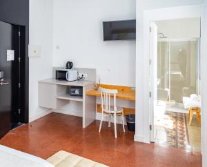 Kuchyňa alebo kuchynka v ubytovaní Hotel Catalina