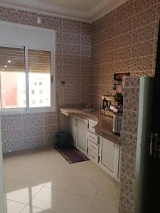 Kuchyň nebo kuchyňský kout v ubytování Appartement comfortable avec vue mer direct