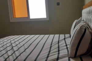 Postel nebo postele na pokoji v ubytování Appartement comfortable avec vue mer direct