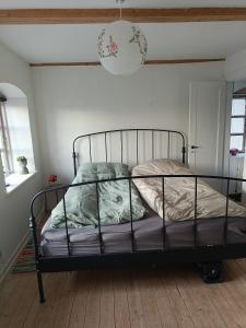 A bed or beds in a room at Charming holiday home with WIFI