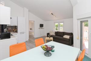 Kuchyň nebo kuchyňský kout v ubytování Apartments Basic Sveti Anton 88