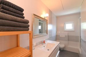 Koupelna v ubytování Apartments Basic Sveti Anton 88 + 37 fotografií