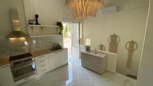 Kuchyň nebo kuchyňský kout v ubytování Siviri Lounge Cottage + 9 fotografií