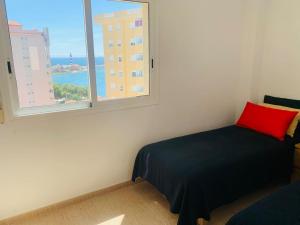 Postel nebo postele na pokoji v ubytování LMHA 15 DPMT modern 2 bedroom,1 bathroom overlooking the Mediterranean, La Manga