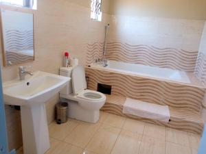 Phòng tắm tại Girlie's bed and breakfast +18 ảnh