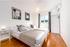 Posteľ alebo postele v izbe v ubytovaní Cozy Vila Summer-Perfect Location + 36 fotografií