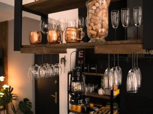 Nápoje v ubytovaní Apartament MT Badger Centrum
