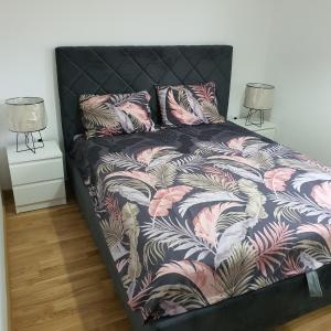 Postel nebo postele na pokoji v ubytování JR Lux apartman