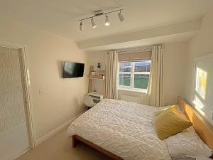 Postel nebo postele na pokoji v ubytování Cosy & Chic in great location near Loughborough Uni & East Midlands Airport