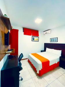 Katil atau katil-katil dalam bilik di Hotel Madrigal