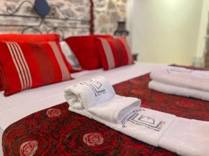 Postel nebo postele na pokoji v ubytování PortaDelMare deluxe suites
