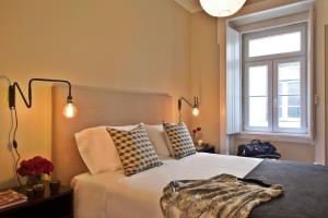 Gulta vai gultas numurā naktsmītnē Lisbon Five Stars Apartments São Julião 72