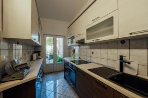 Kuchyňa alebo kuchynka v ubytovaní Guesthouse Villa Diana