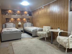 Ein Bett oder Betten in einem Zimmer der Unterkunft Guest House Vilnius + 12 Fotos