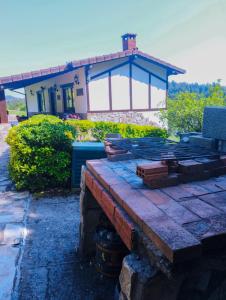 a pile of bricks sitting on top of a house at Basoeta in Santa Ana